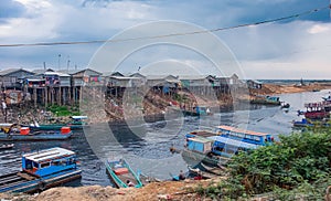 Unsanitary living conditions on lake Tonle Sap