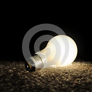 Unscrewed Glowing Light bulb