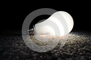 Unscrewed Glowing Light Bulb