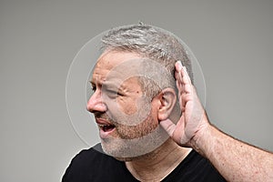 Unshaven Caucasian Male Listening