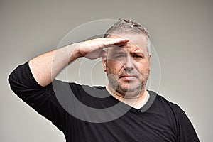 Unshaven Caucasian Male Saluting