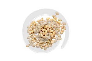 Unshelled pine nuts isolated on a white background