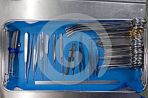 Unsorted surgical instruments after cleaning in the washing machine