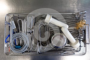 Unsorted surgical instruments after cleaning in the washing machine