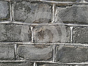 Texture of old blocks on cement wall in vintage style.