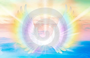 Spiritual guidance, Angel of light and love doing a miracle on sky, rainbow angelic wings, Flower of Life