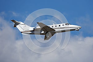 Untitled business jet passenger plane at airport. Corporate flight travel. Aviation and aircraft. Vip transport. Company