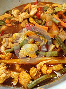 Delicious Spicy Tomyam Soup with Prawns and Herbs â Authentic Thai Cuisine