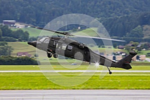 Untitled military helicopter flying. Army helicopter with no markings. Air force.