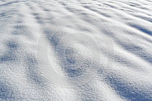 Untouched snow, pristine snow background, fresh fallen snow on sunny day