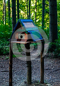 unusual birdhouse birdhouse in the park standing on three poles