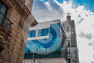 Unusual building of glass and combined with old architecture. Havana, Cuba.