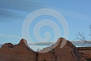Window Rock, AZ. Unusual clouds over mountains photo