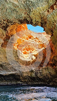 An unusual coastal cave, famous for its distinctive vaulted opening