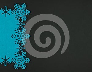 Unusual design christmas background with blue snowflakes