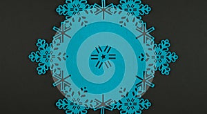 Unusual design christmas background with blue snowflakes and copy space