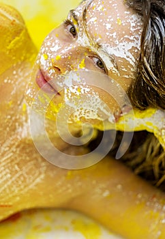 Unusual especially amazing portrait of a sexy young woman, dots of white and yellow color, decorative creative expressive abstract