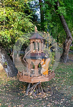 An unusual feeder for birds and small animals in a public park
