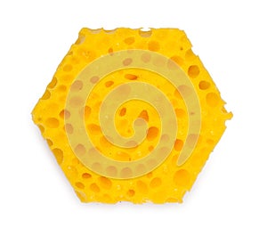 Unusual, hexagonal sponge for washing and cleaning of kitchen ware. Isolated on a white background, close-up, top view