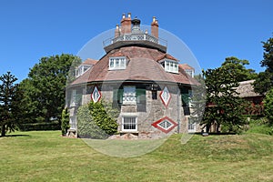 Unusual historic sixteen sided house on a beautiful sunny summers day in Devon, England