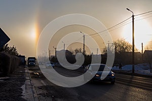 An unusual natural phenomenon is a halo, an atmospheric optical phenomenon around the sun in the early morning