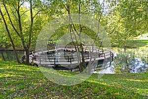 Unusual ring bridge on a small pond