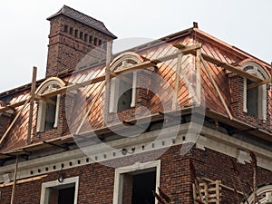 Unusual roof in a new outbuilding house