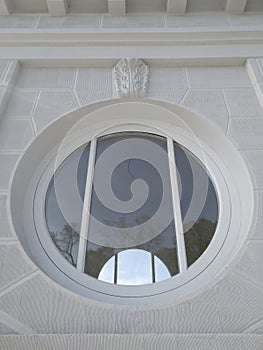 Unusual round window of the building.