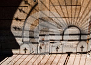 Unusual shadows on old doors