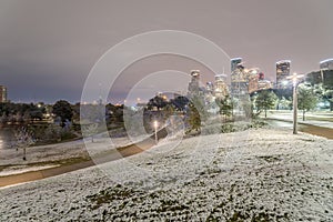 Unusual snow in Downtown Houston and snowfall at Eleanor Park