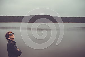 Unusual woman in long skirt as concept outdoors