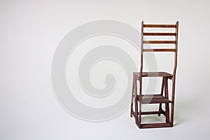 Unusual wooden chair on a white background