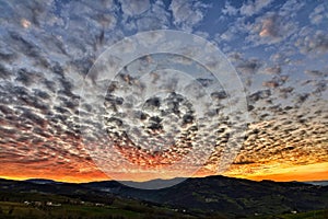 unusually cloudy sky at sunset