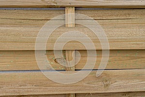 unvarnished slats of a wooden latticework for outdoor use photo