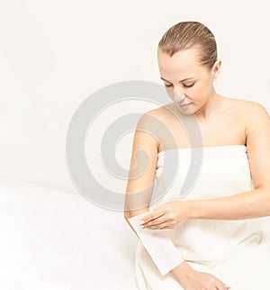 Unwanted hair wax epilation. Young Woman. cosmetology salon treatment procedure. Home waxing