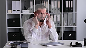 Unwell Office Worker Suffering From Headache