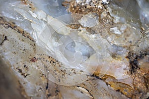 Unworked, natural quartz stone. close up. background. Wall paper. photo