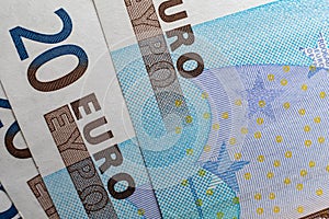 An up-close shot of the microprinting on a Euro banknote, highlighting the advanced tamper-proof technology used to