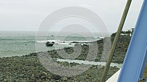 Up view of waves of ocean from cliffy shore of the north of Madeira