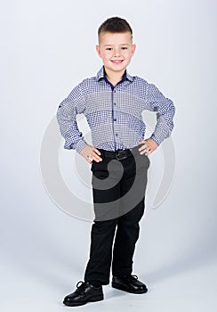 Upbringing and development. Confident boy. Little boy wear formal clothes. Cute boy serious event outfit. Impeccable