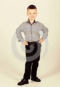 Upbringing and development. Confident boy. Little boy wear formal clothes. Cute boy serious event outfit. Impeccable