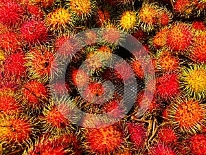 Upclose a pile of rambutans