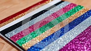 Upclose shallow depth of field shot of a pile of colorful rectangular paper tiles