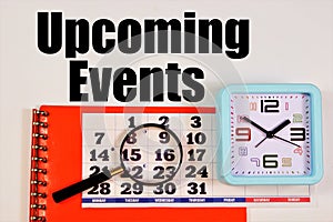 Upcoming events. Text label on the background of the clock and calendar.