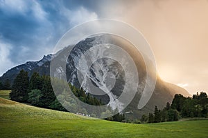 Upcoming Rain in the Alps at Sunset