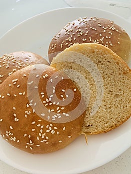 Uper decorated sesame of few buns.