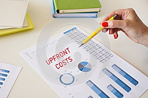 UPFRONT COSTS phrase on the piece of paper photo