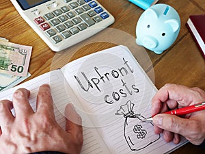 Upfront costs is shown on the business photo using the text photo