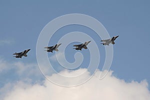 Upgraded MiG-31K interceptor fighters with a hypersonic Dagger missile on the hull in the sky over Moscow`s Red Square during the