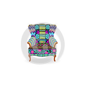 Upholstered armchair with a multi-colored upholstery in ethnic style. Cushioned furniture, room decoration, interior design